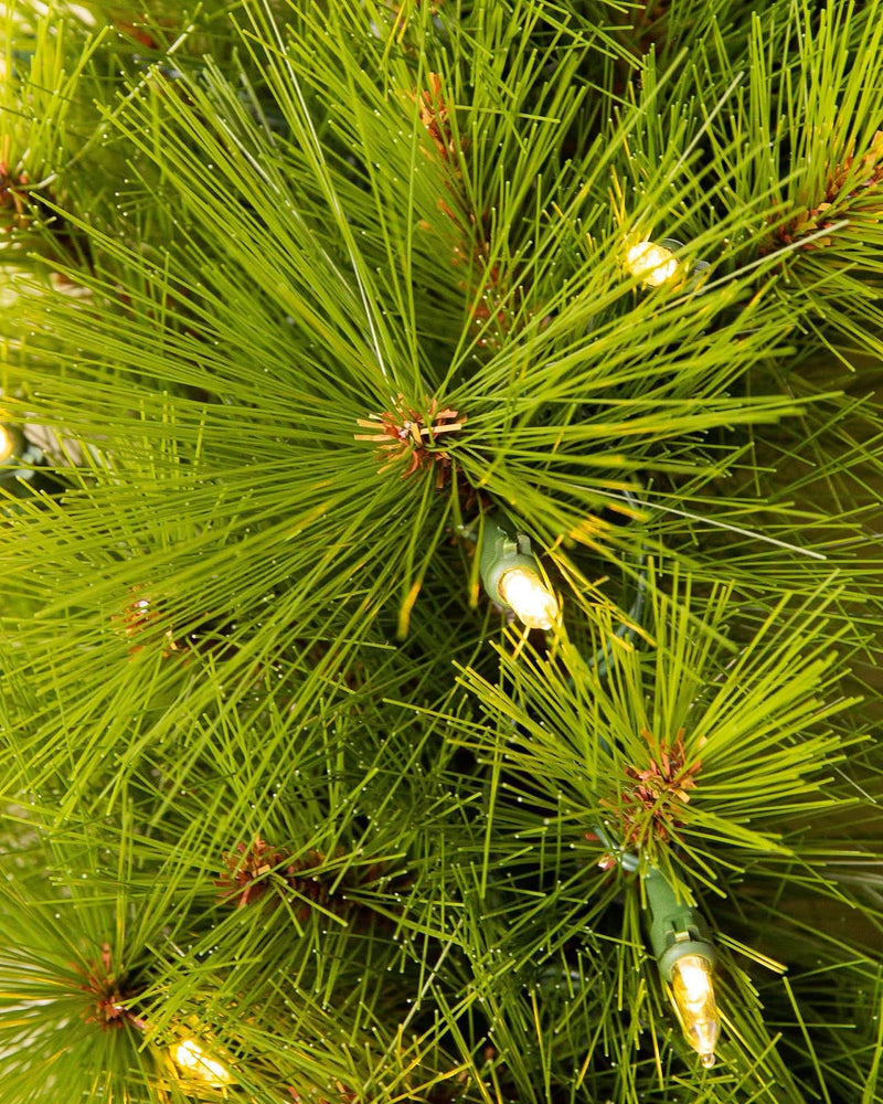 1,80m - Árbol de Navidad verde de pino de Monterey con ramas largas, soporte de metal y micro LED de colores integrados